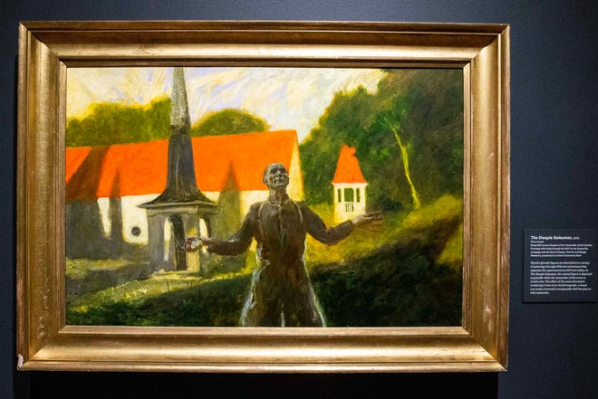 Artist Jamie Wyeth's painting entitled The Steeple Salesman is featured during the press preview of Wyeth's new exhibition Jamie Wyeth: Unsettled at the Brandywine Museum of Art in Chadds Ford, Pa., Friday, March 15, 2024. The exhibit features more than 50 works drawn from museum and private collections across the country that "trace a persistent vein of intriguing, often disconcerting imagery," over Wyeth's career.