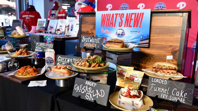 A variety of items are displayed during an event to highlight what is new for the 2024 Philadelphia Phillies season at Citizens Bank Park in Philadelphia on Monday, March 25, 2024.