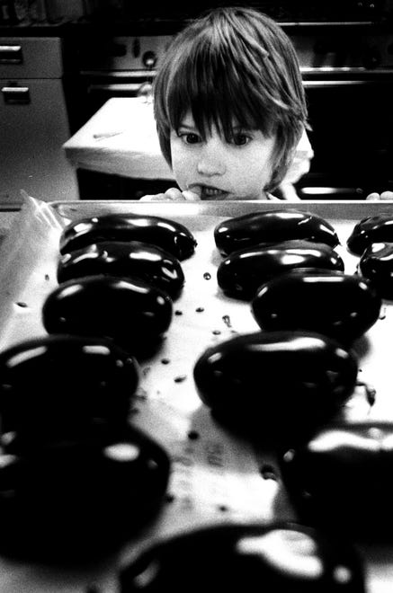 Billy Joyce, 4, eyes chocolate Easter eggs in 1977.