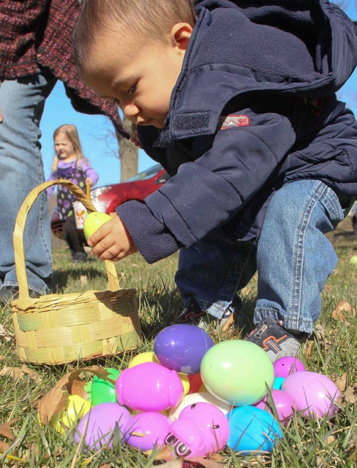 Conrad Gopie, 1, finds a pile of eggs at the Easter egg hunt at Limestone Presbyterian Church on Saturday in 2013.