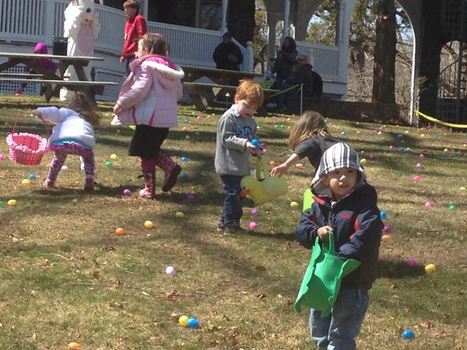 Kids search for Easter eggs Saturday on the grounds of Auburn Heights Preserve. About 200 kids and 550 people attended the event in 2015.