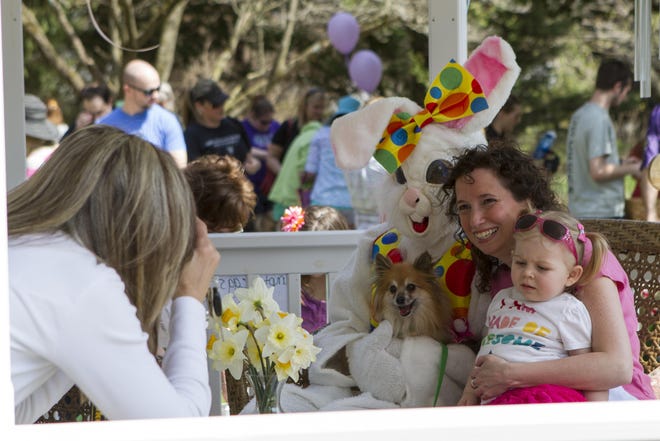 Deanna Pedicone, her daughter, Zoe, and their dog, Annabelle, with the Easter Bunny at Easter Bone Hunt in 2014.