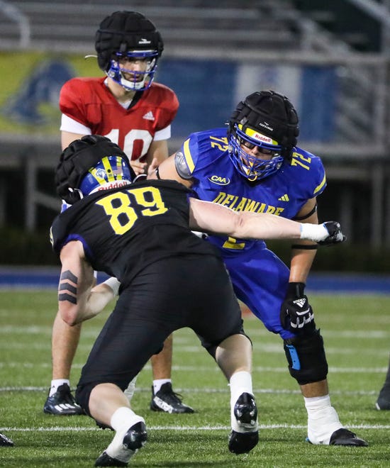 Delaware offensive lineman Jaime Ramos lines up against Nate Ray (89) during the Blue and White Spring Game at Delaware Stadium, Friday, April 19, 2024.