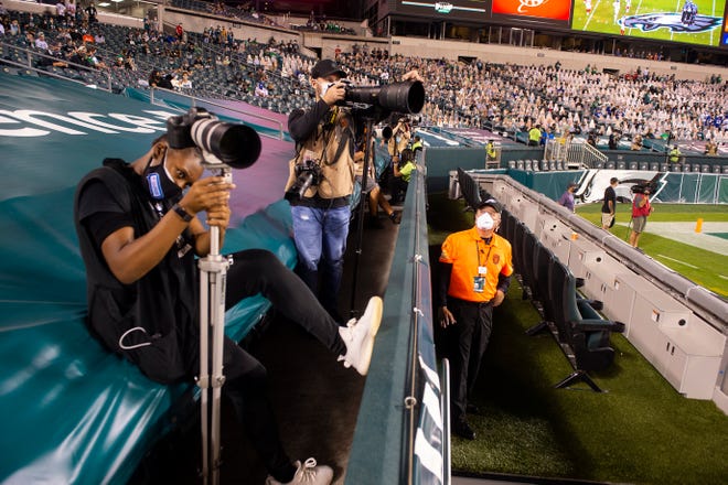 Photographers shoot from the first row instead of the field due to Covid19 precautions during a game against the Giants Thursday, Oct. 22, 2020 in Philadelphia, Pa.