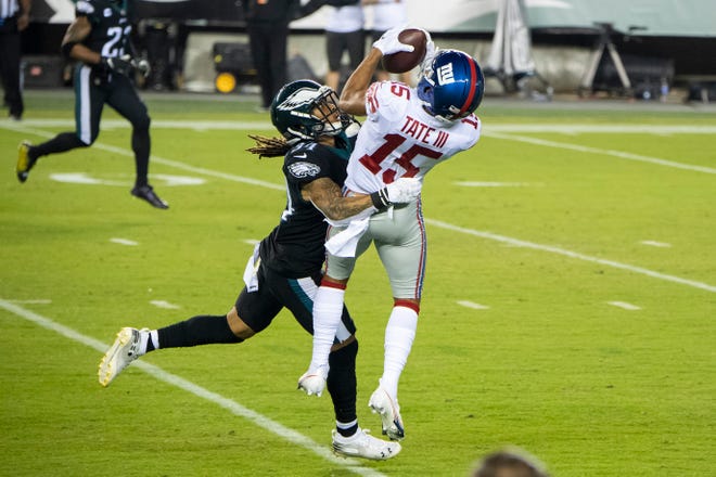 Giants' Golden Tate III (15) makes a reception for a touchdown over Eagles' Cre'Von LeBlanc (34) in Philadelphia, Pa. on Thursday, Oct. 22, 2020.